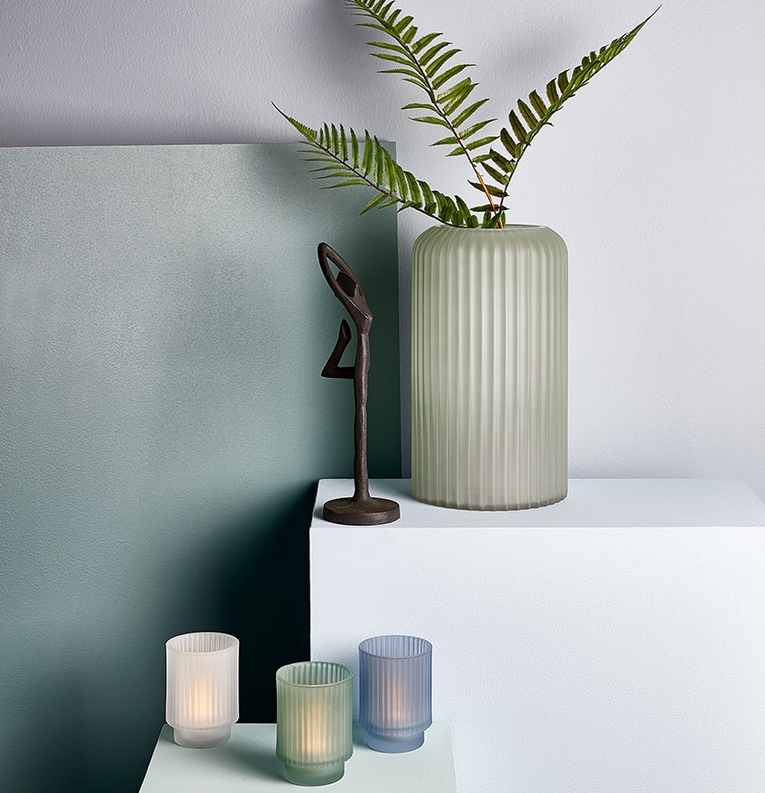 Black ornament TYGE, ELVIN tealight holders and SIVERT vase with artificial plant, in dusty blue and green colours Black ornament, tealight holders and vase with artificial plant, in dusty blue and green colours