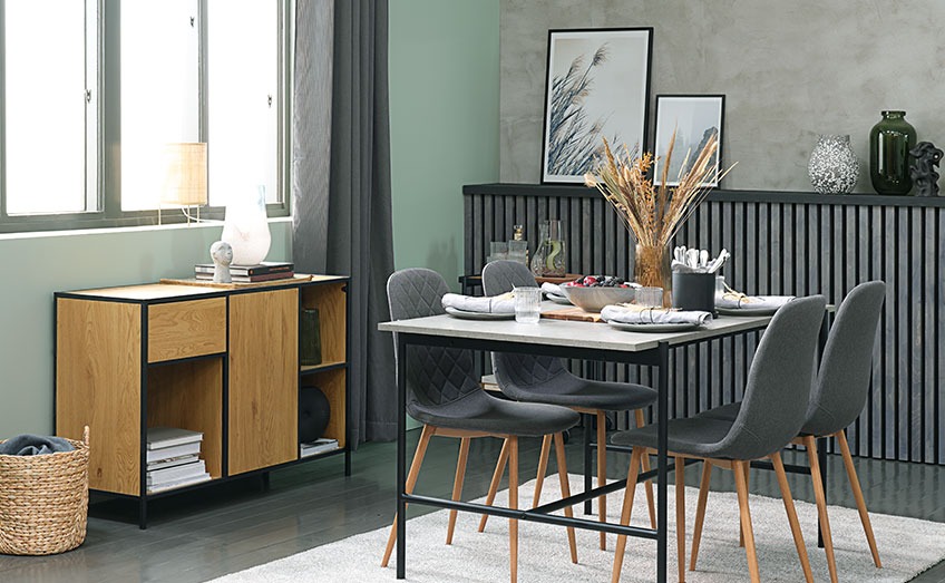 TERSLEV dining table and JONSTRUP dining chairs and TRAPPEDAL sideboard Living room with dining table with concrete-look, grey dining chairs and an oak sideboard