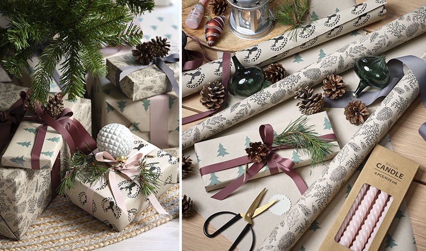 Christmas gifts decorated with Christmas baubles, twigs, and pine cones